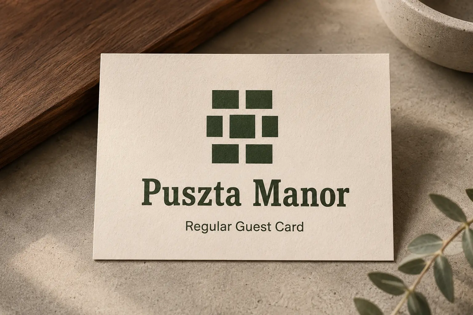 Puszta Manor Regular Guest Card in the venue’s cream and forest-green design